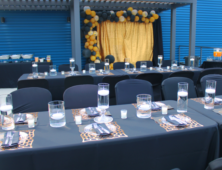 A party takes place on the rooftop terrace venue at DSTATION.